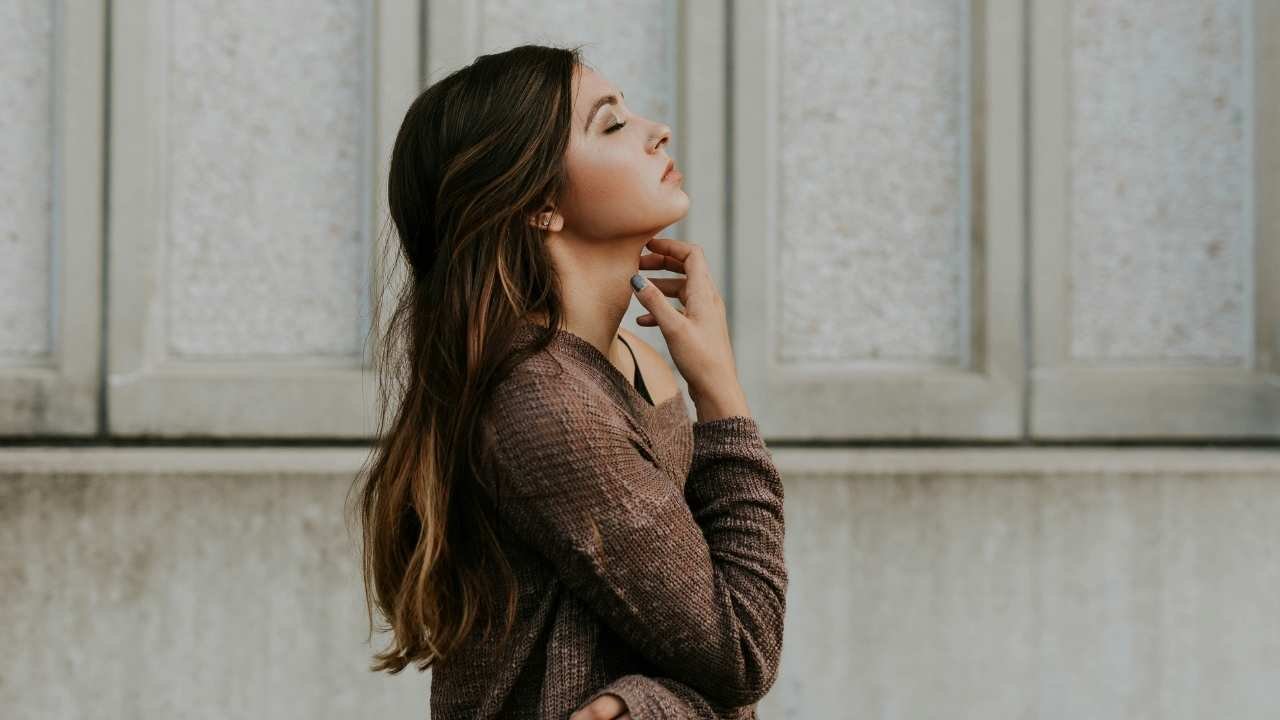 A person quietly meditating, staying relaxed and present in the moment.